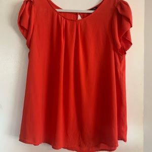 Bright coral red/orange top with tulip sleeves. Papermoon 1X